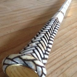 Carved/ scrimshawed antler art piece