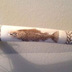 Carved/ scrimshawed antler art piece